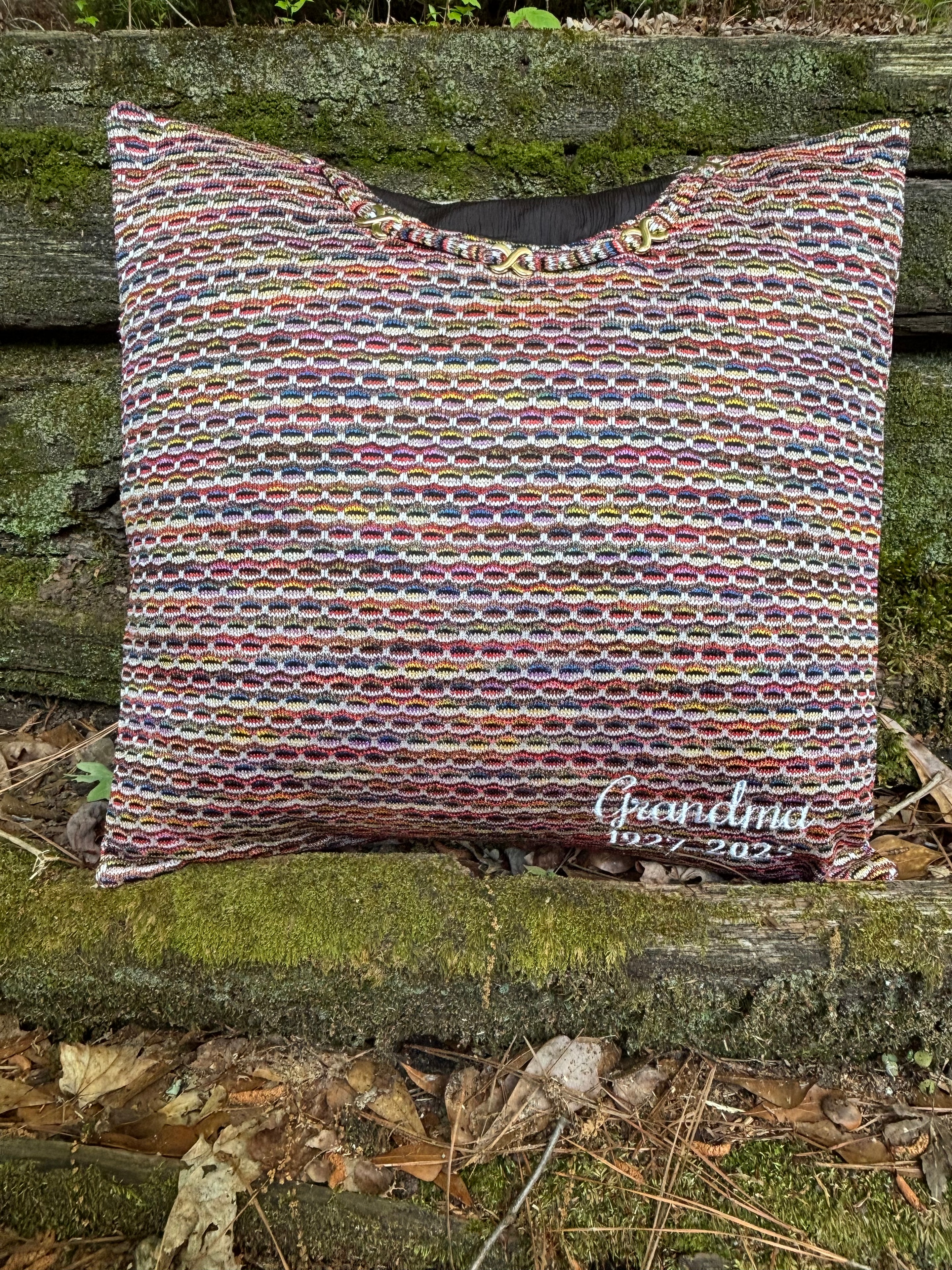 Handmade quilt draped over armchair